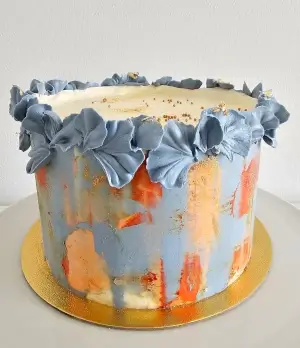 Artistic buttercream cake with painted texture