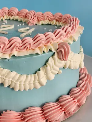 Blue vintage cake with pink piping