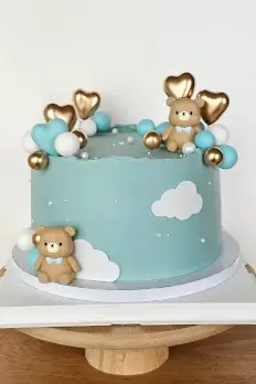 Blue kids teddy bear cake with gold heart